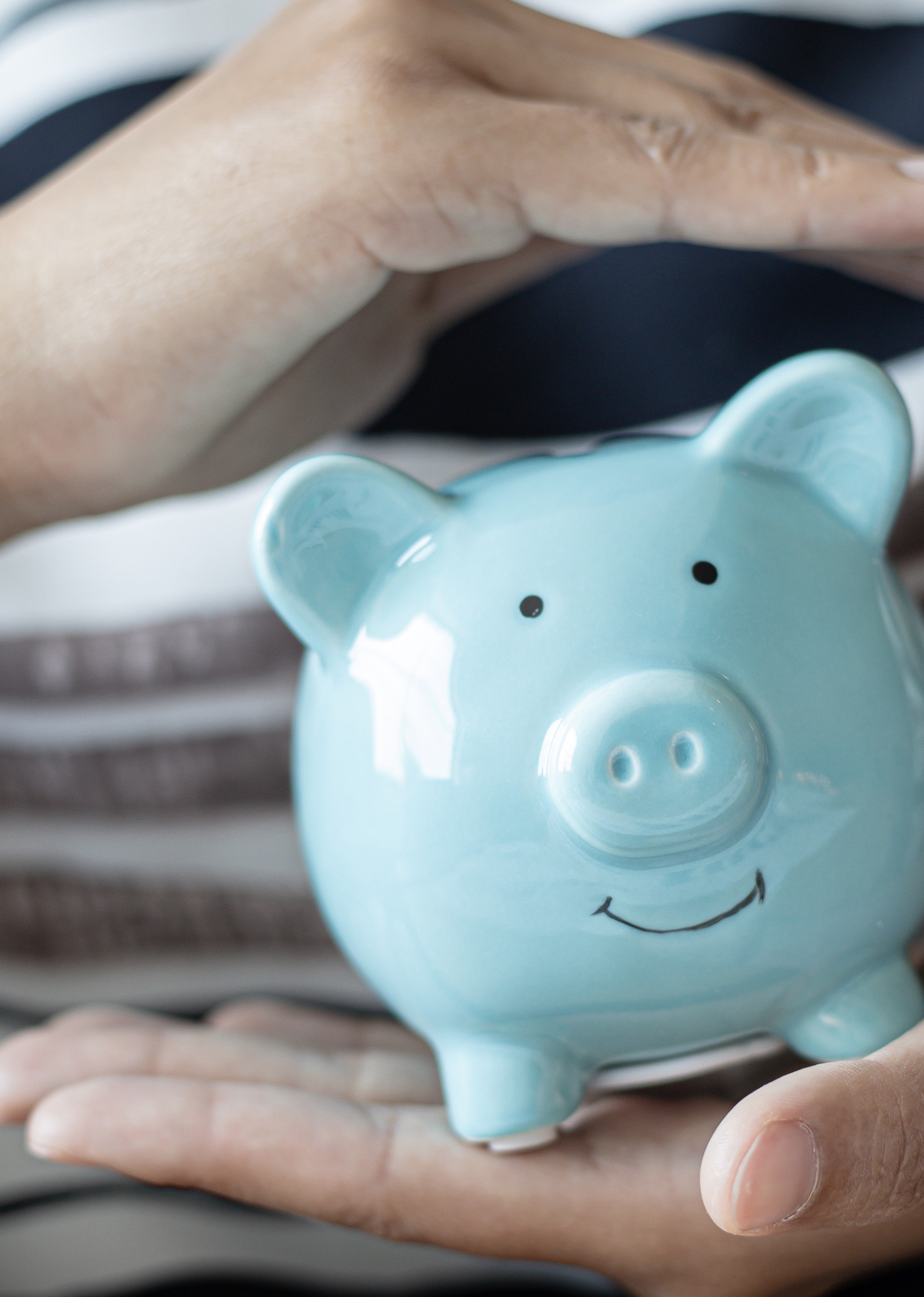 Piggy bank wearing glasses representing financial savings